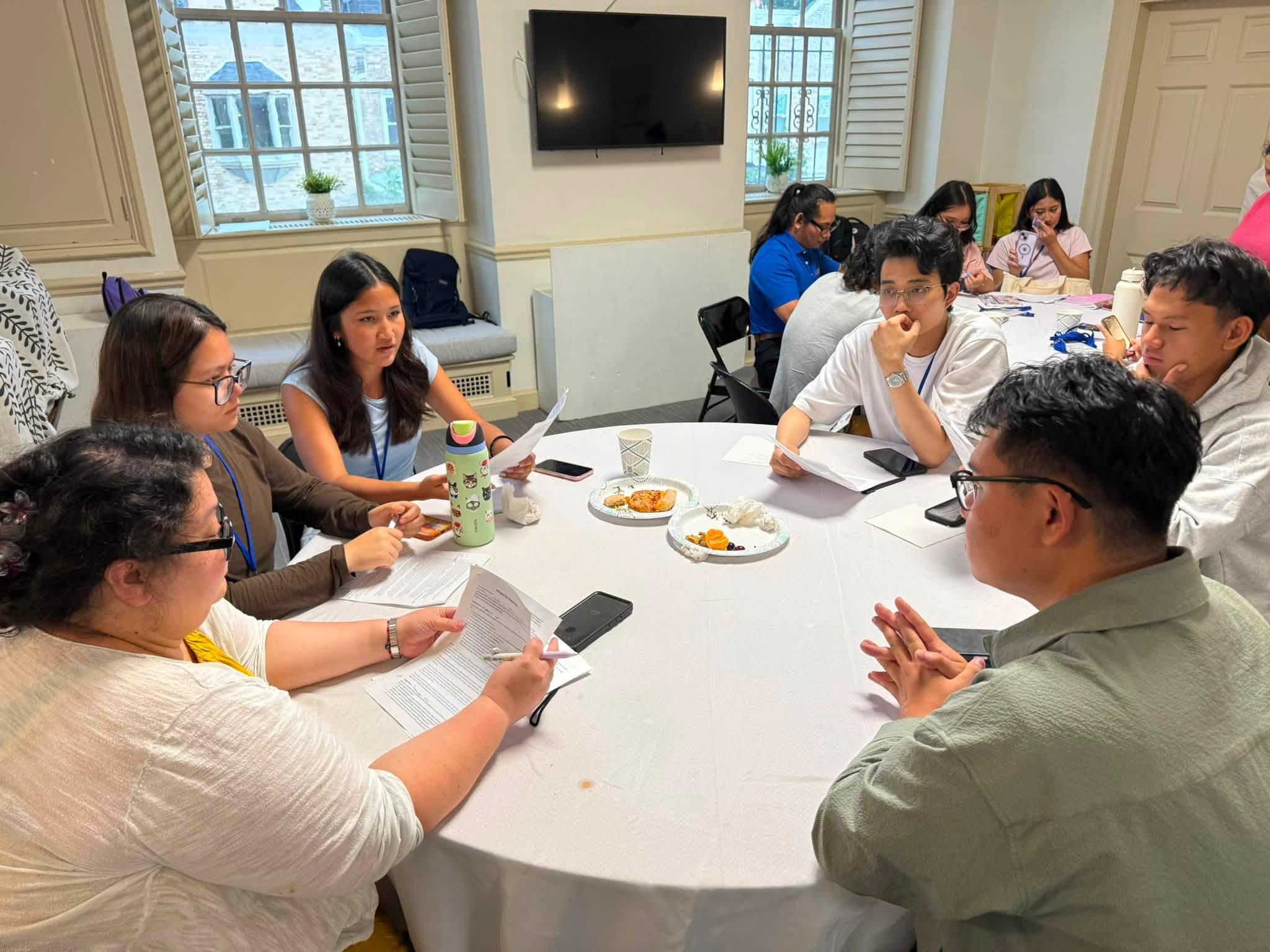 Small-group discussion with printed handouts